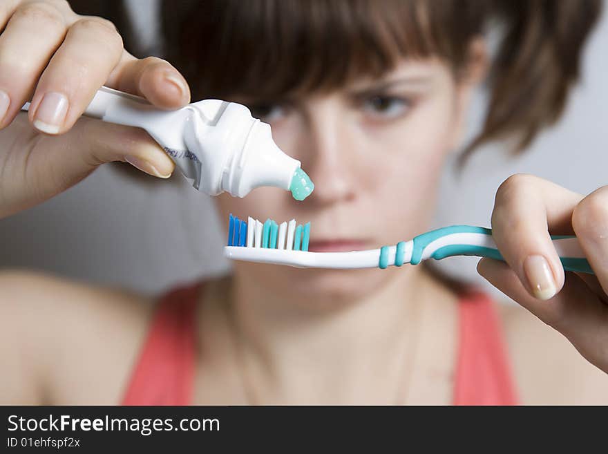 Young Woman Geting Ready To Clean Teeth