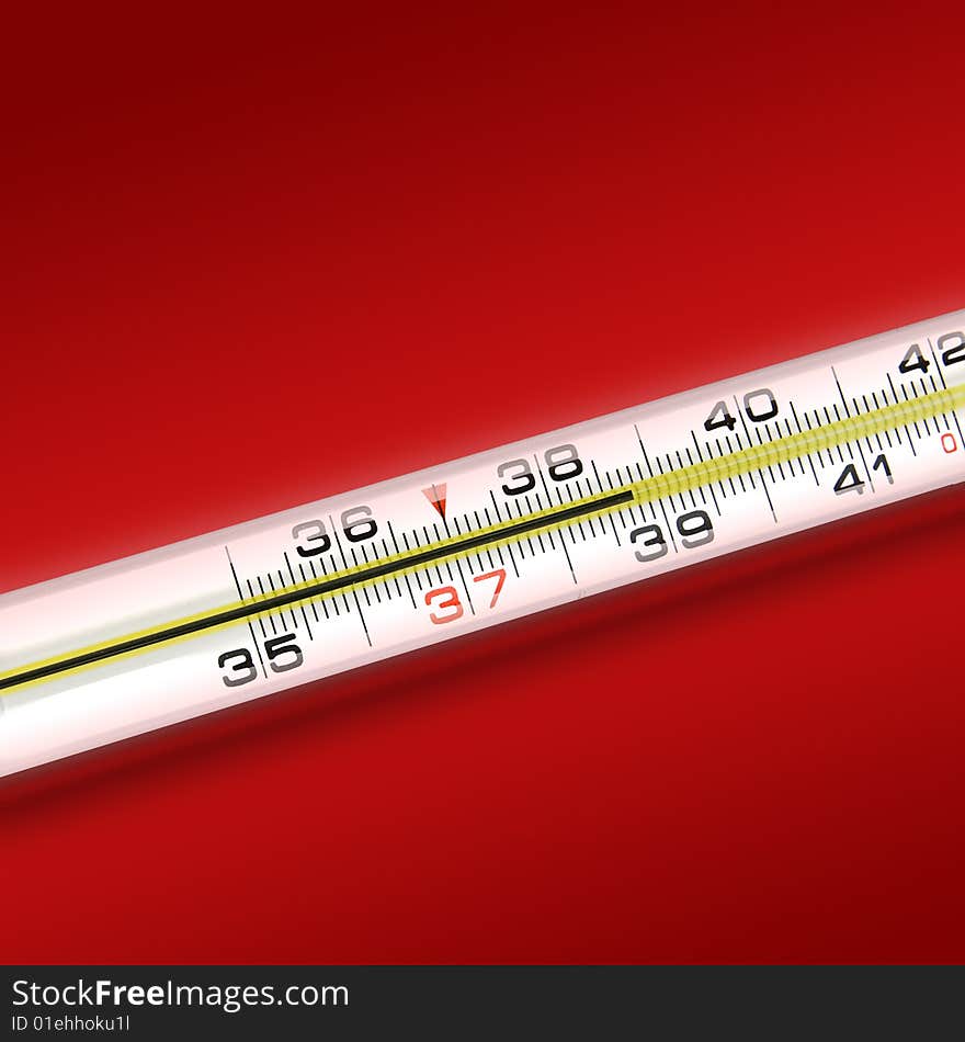 Close-up thermometer on green background