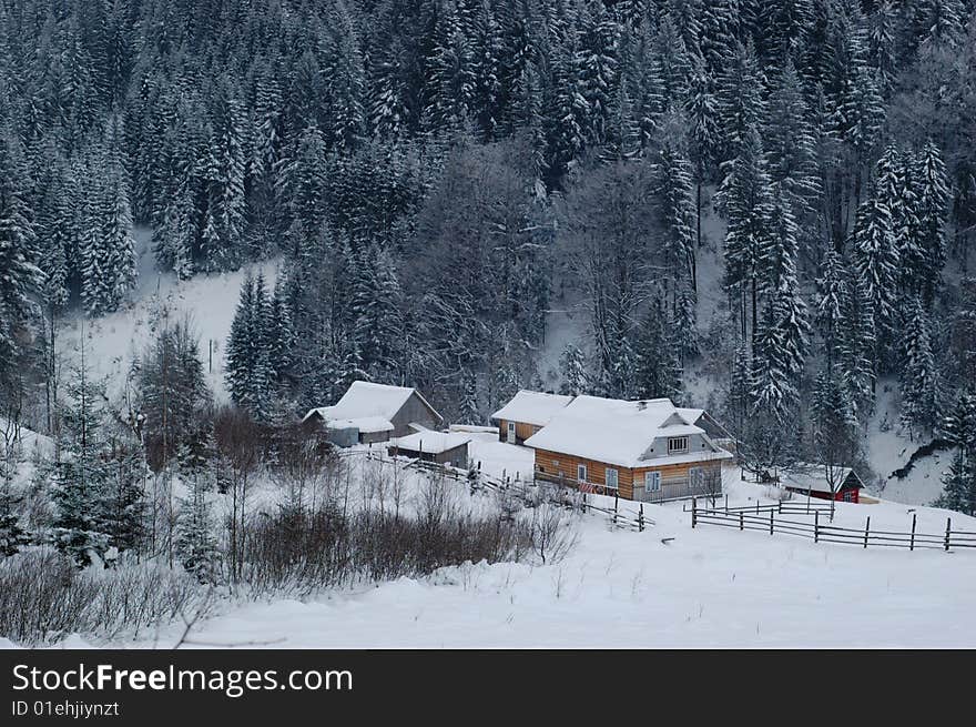 Village In The Winter Forest