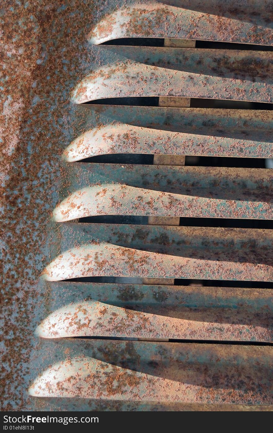 Seven rusty hood fins