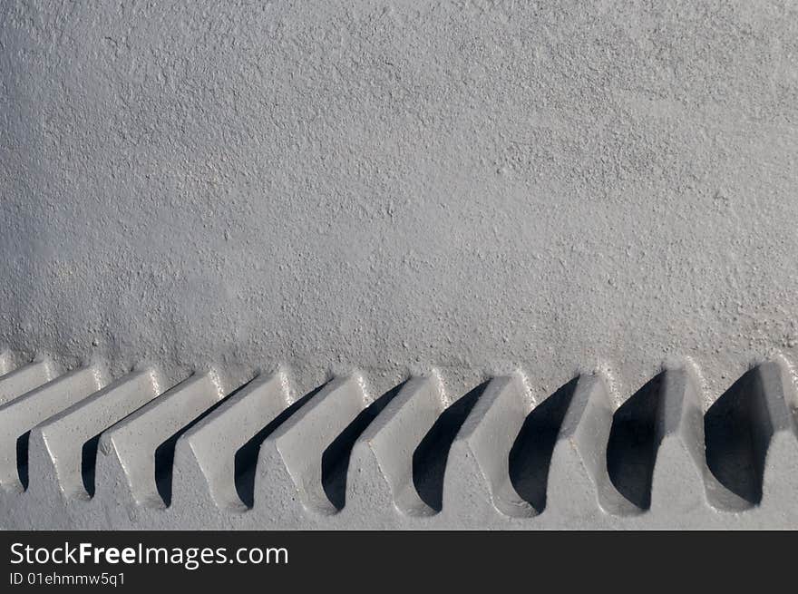 Closeup of cement mixer gear teeth, from vintage farm machinery. Closeup of cement mixer gear teeth, from vintage farm machinery