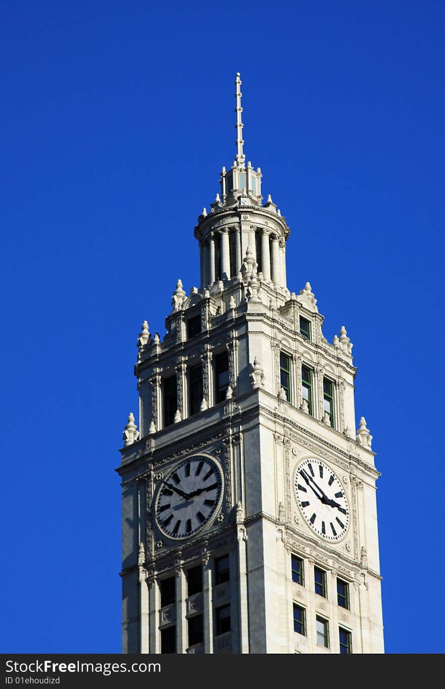 Two clocks are on the beautiful Wrigley building in downtown Chicago. Two clocks are on the beautiful Wrigley building in downtown Chicago.