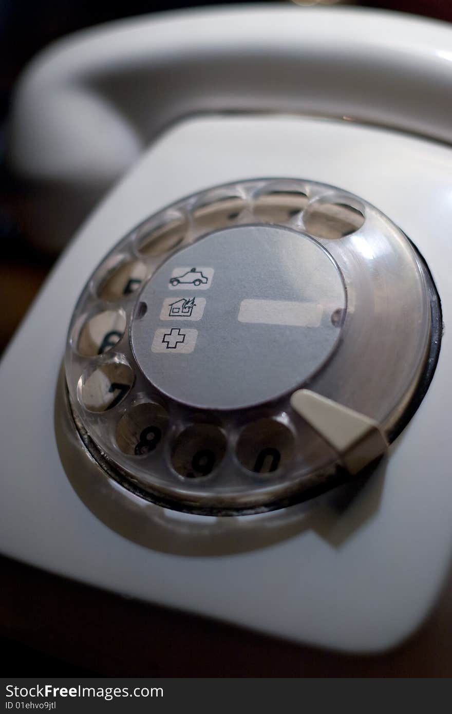 Old vintage white phone closeup