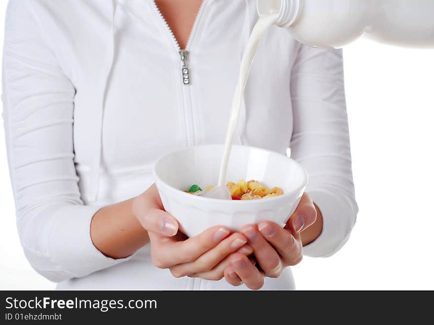 Portrait of young woman with plate of muesli and milk. Portrait of young woman with plate of muesli and milk