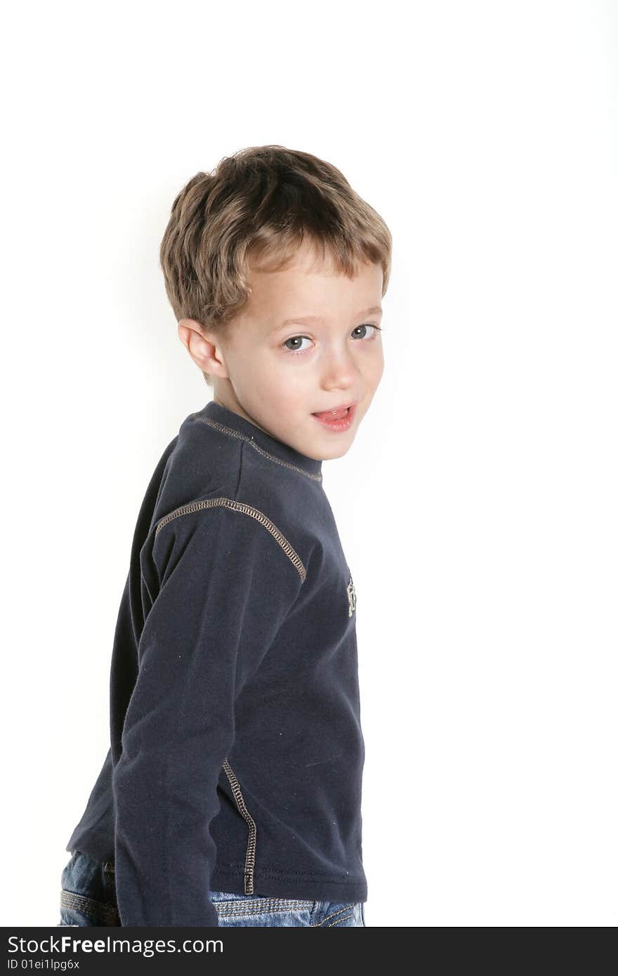 Cute four year old boy on white background