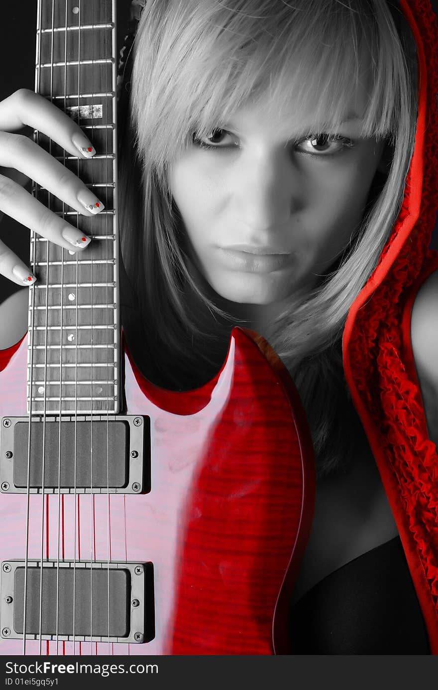 Woman with electric guitar