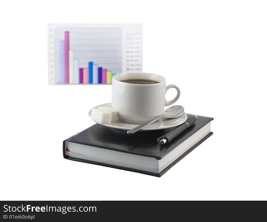 Coffee cup, standing on the black personal organizer, on a back background - financial  diagram . Focus at the pen. Isolated on white. Coffee cup, standing on the black personal organizer, on a back background - financial  diagram . Focus at the pen. Isolated on white.