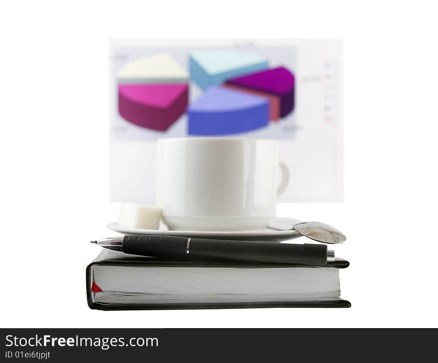 Coffee cup, standing on the black personal organizer, on a back background - financial  diagram . Focus at the pen. Isolated on white. Coffee cup, standing on the black personal organizer, on a back background - financial  diagram . Focus at the pen. Isolated on white.