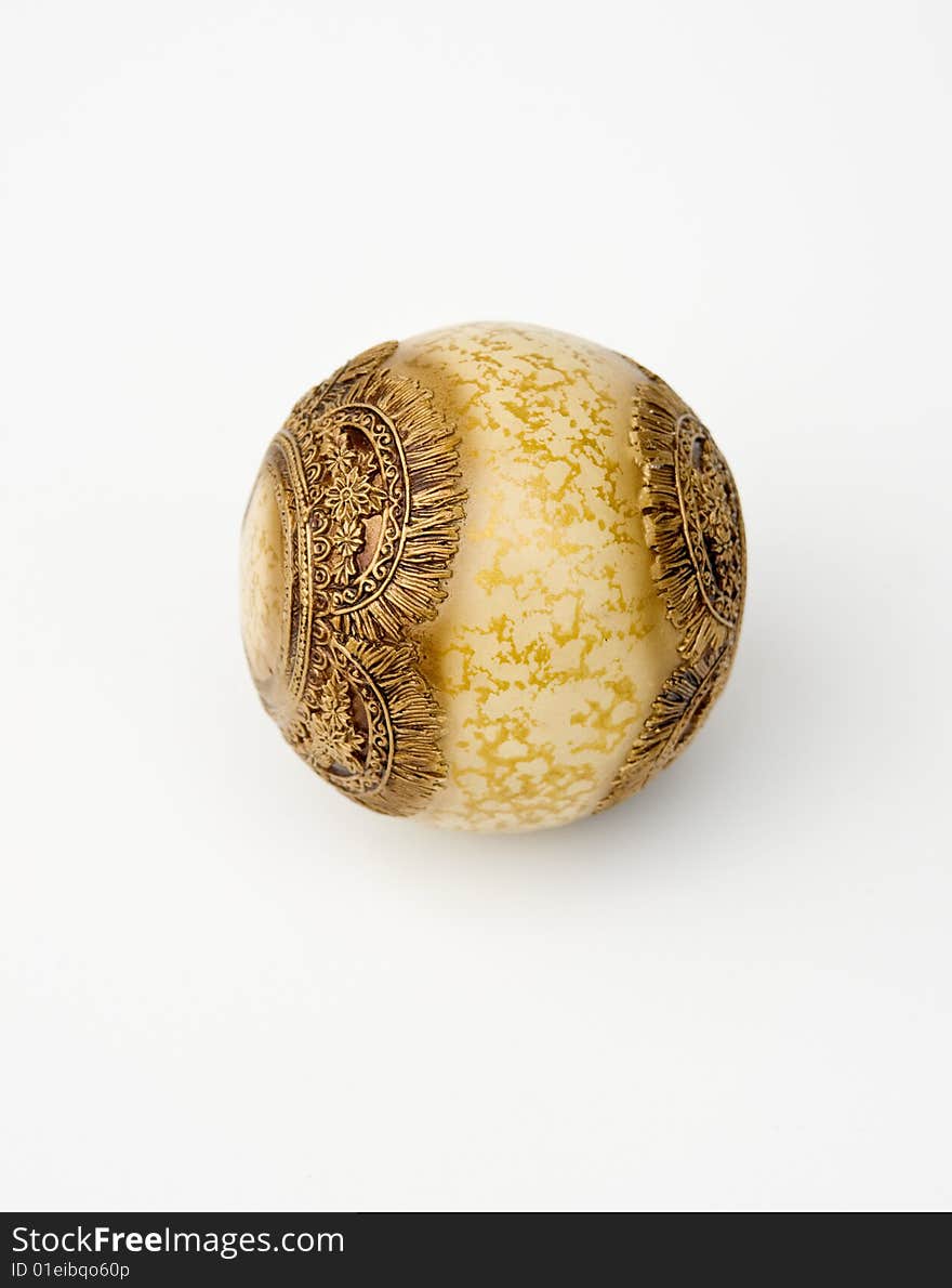 Ball ornament whit gold texture on white background