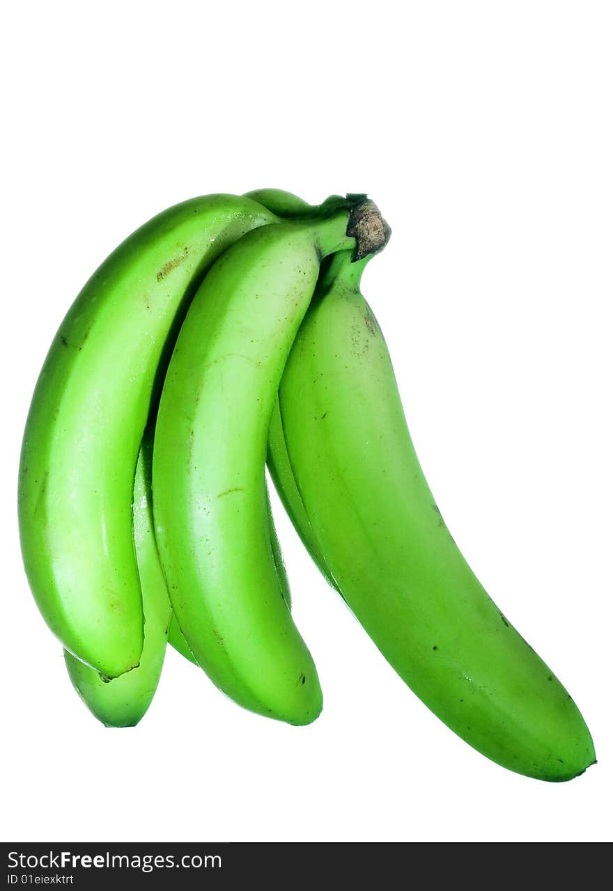 Green bananas isolated on white background, unripe fruits