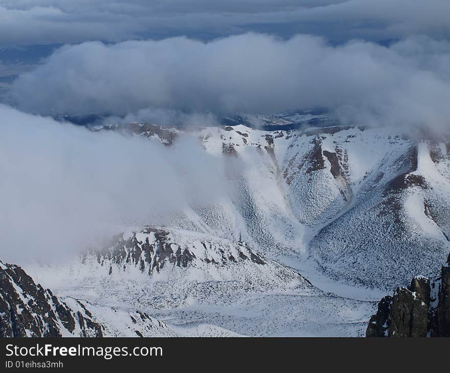 winter mountains covered with snow and fog. winter mountains covered with snow and fog