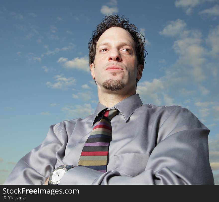 Businessman On A Blue Sky