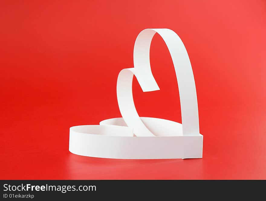 Two hearts, on red background. Focus on a front part. Two hearts, on red background. Focus on a front part.