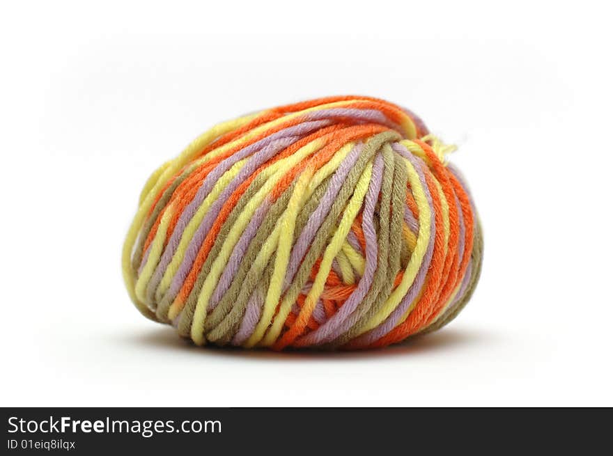 Bale of colorful yarn isolated over white