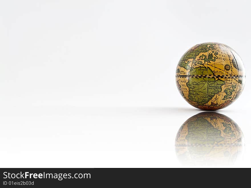 Earth on white background. reflex image. Earth on white background. reflex image