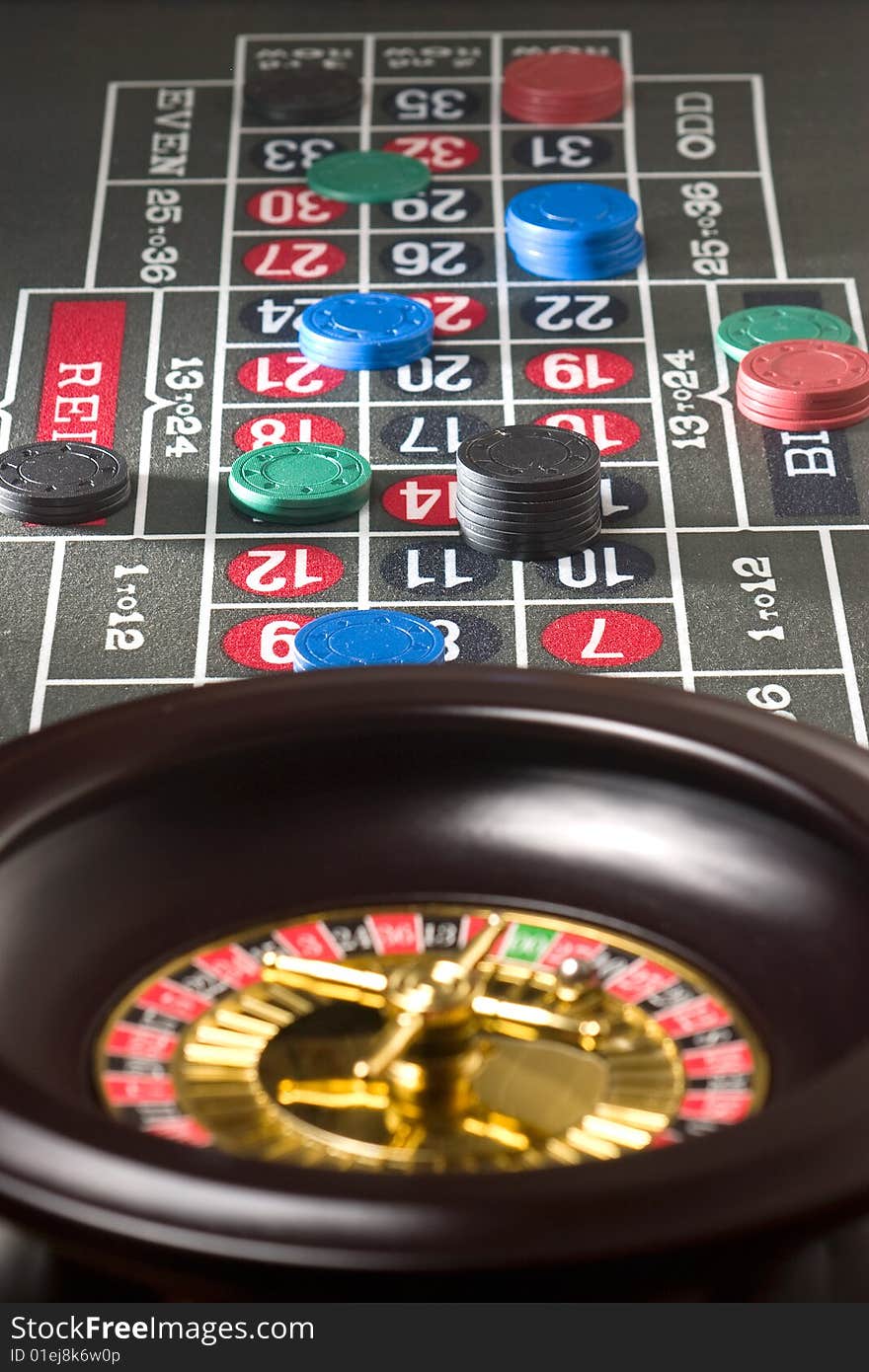 Chips down on a roulette table showing stacks on winning positions. Chips down on a roulette table showing stacks on winning positions