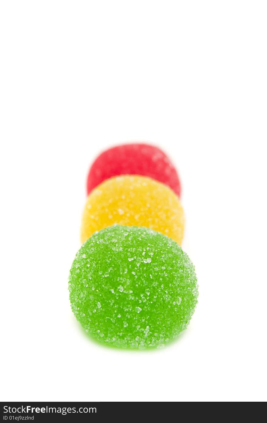 Sweet fruit color candy on white background