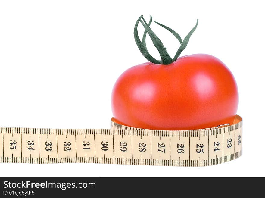 Fresh Tomato with measuring tape on white background