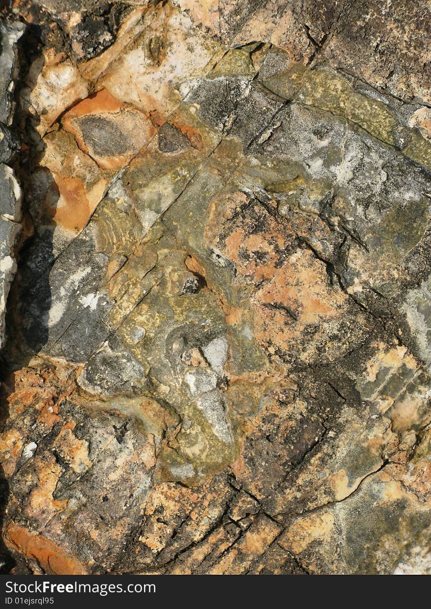 Shot of a colorful natural pattern from a rock. Great for wallpapers or backgrounds. Shot of a colorful natural pattern from a rock. Great for wallpapers or backgrounds.