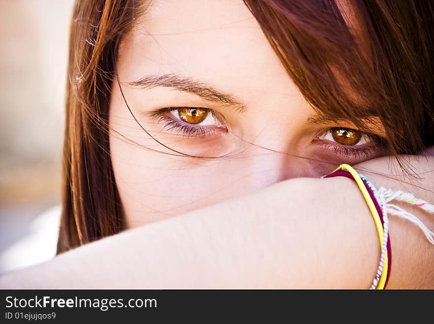 Young woman staring at camera. Young woman staring at camera.