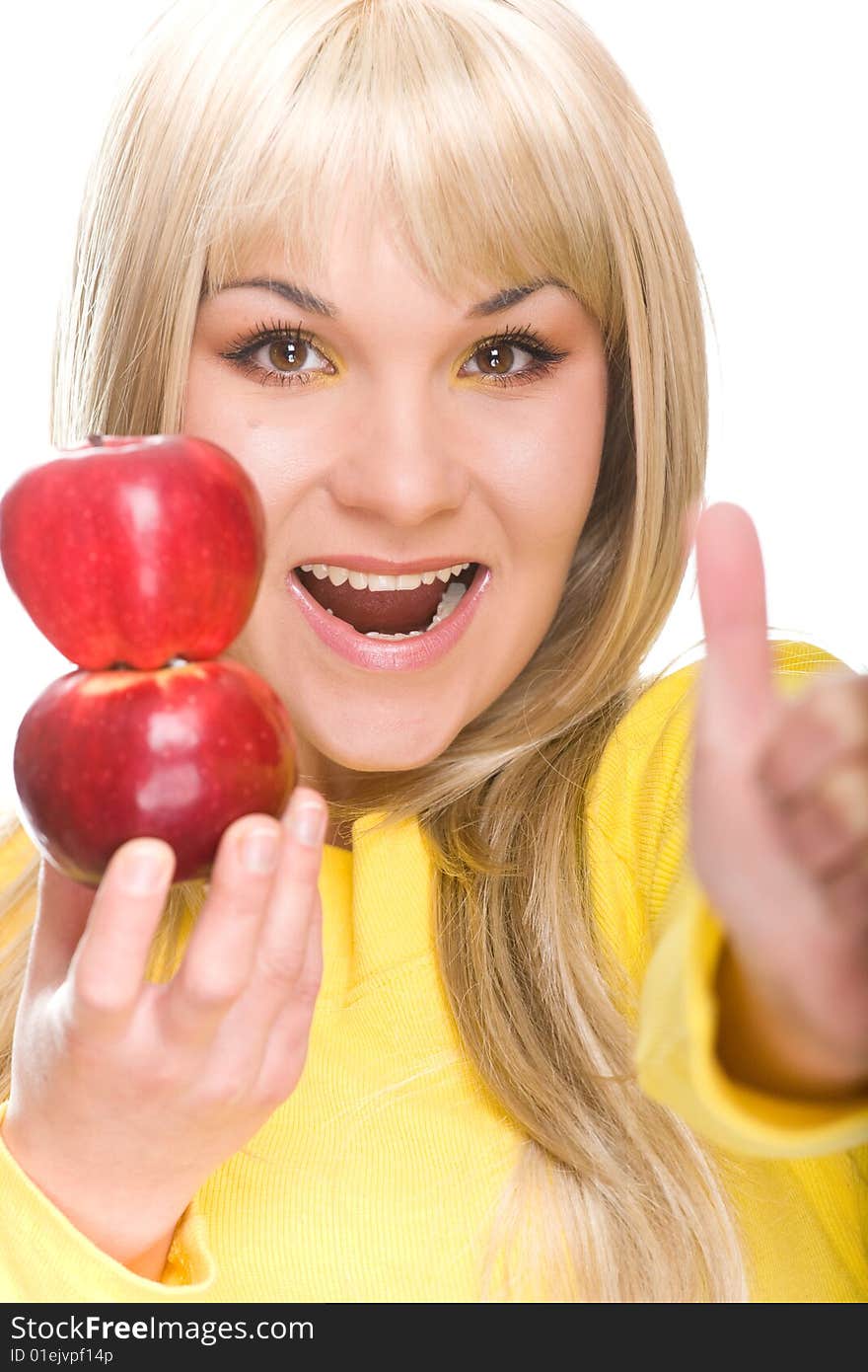 Attractive woman with apple. over white background. Attractive woman with apple. over white background