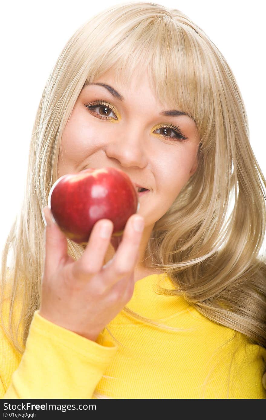 Attractive woman with apple. over white background. Attractive woman with apple. over white background