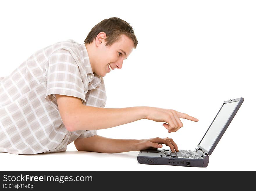 Casual happy teenager with laptop.over white background. Casual happy teenager with laptop.over white background