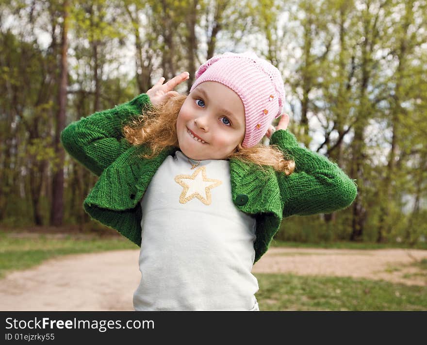 Little girl in spring forest