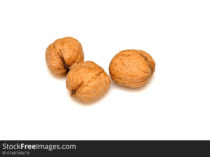 Walnuts against on white background