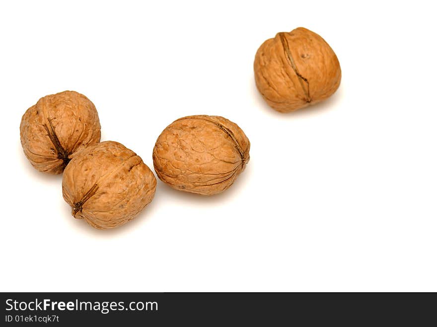 Walnuts against on white background