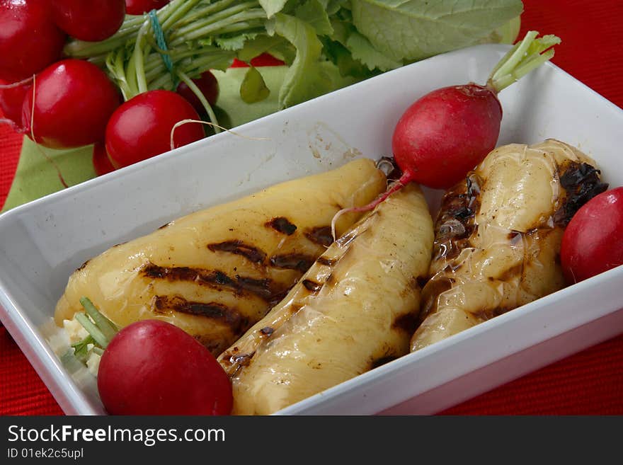 Grilled yellow peppers filled with cheese and fres