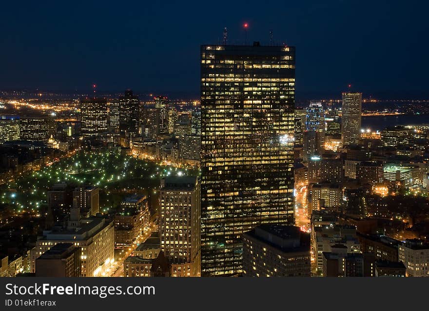 Evening flight over big city