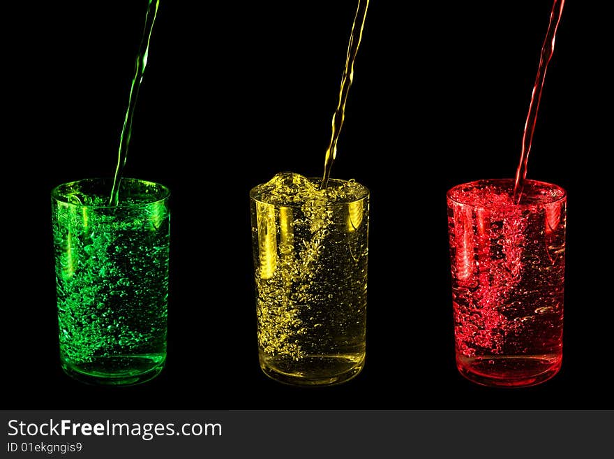 Glasses with drink.  Isolated on a black background