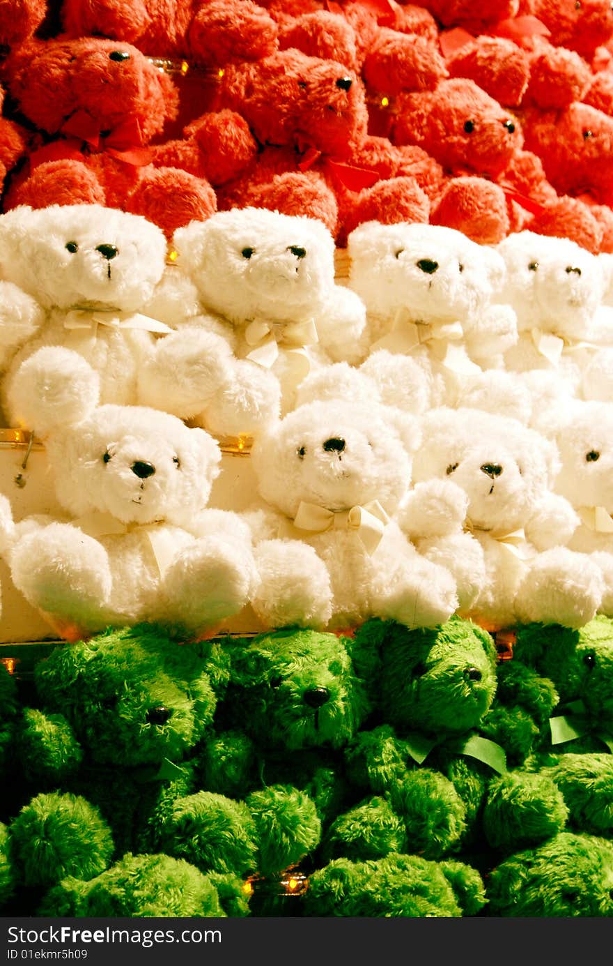 Colorful Teddy Bears Arranged In Their Respective Colours.