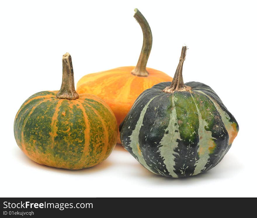 Three fancy pumpkins isolated over white