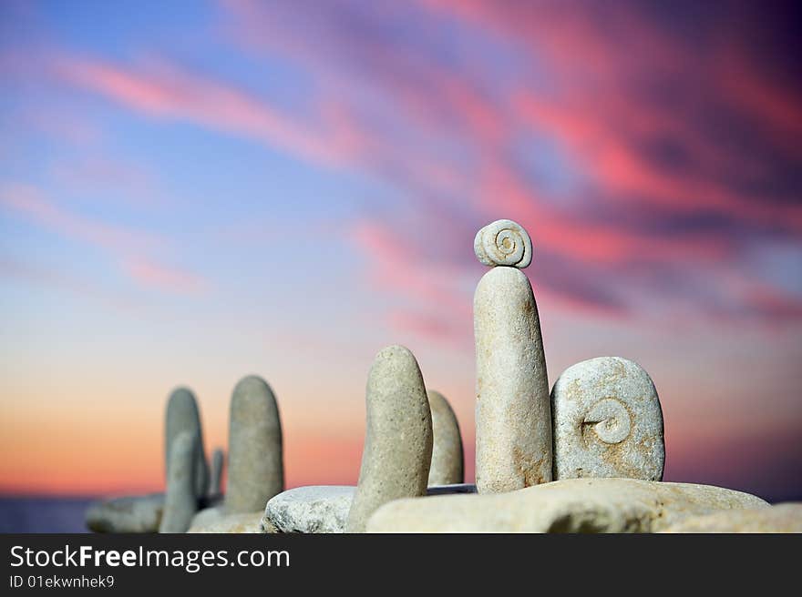 Sea stones in evening light on a beach in the summer. Sea stones in evening light on a beach in the summer