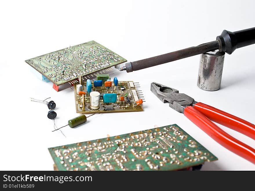 A soldering iron on white background