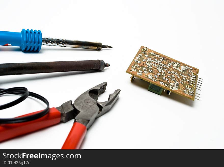 Soldering iron on white background