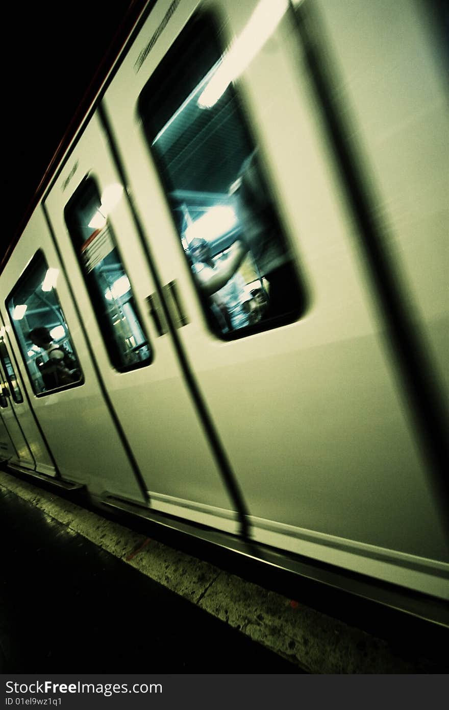 Dynamic view of a subway train leaving the station. Dynamic view of a subway train leaving the station.