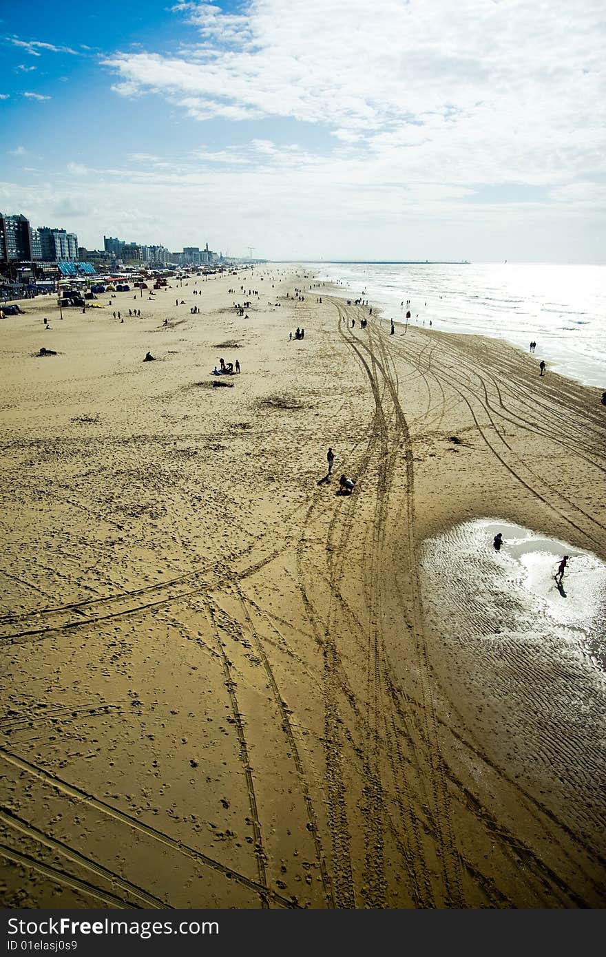 High view of a sunny sandy beach. High view of a sunny sandy beach.