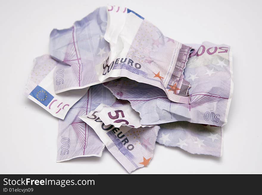 Torn Euro bills lying in heap. Torn Euro bills lying in heap