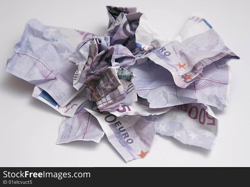 Torn Euro bills lying in heap. Torn Euro bills lying in heap