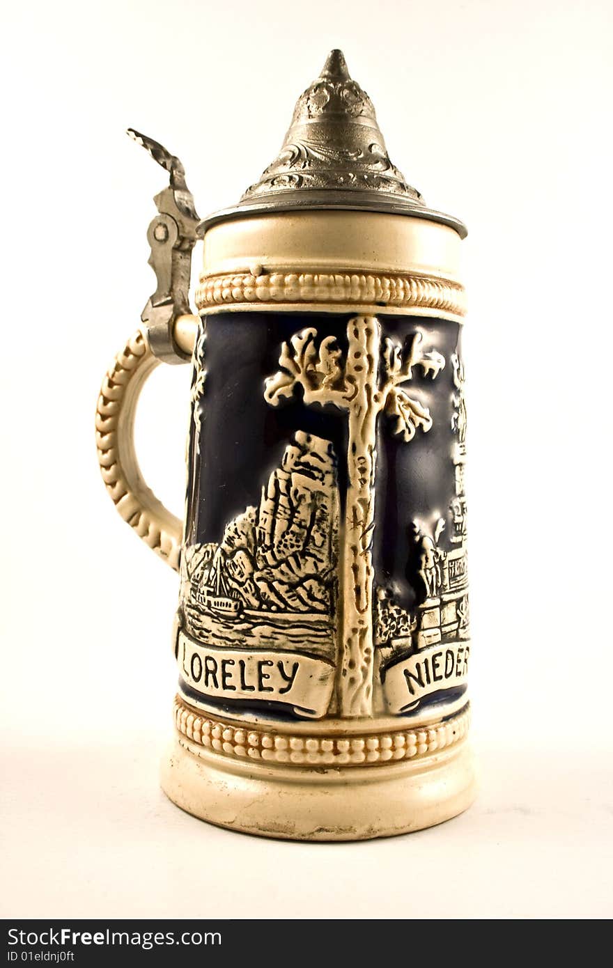 Medieval beer cup with metal cover and drawings. Medieval beer cup with metal cover and drawings