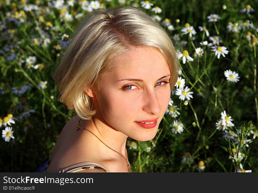 Young Woman With daisy