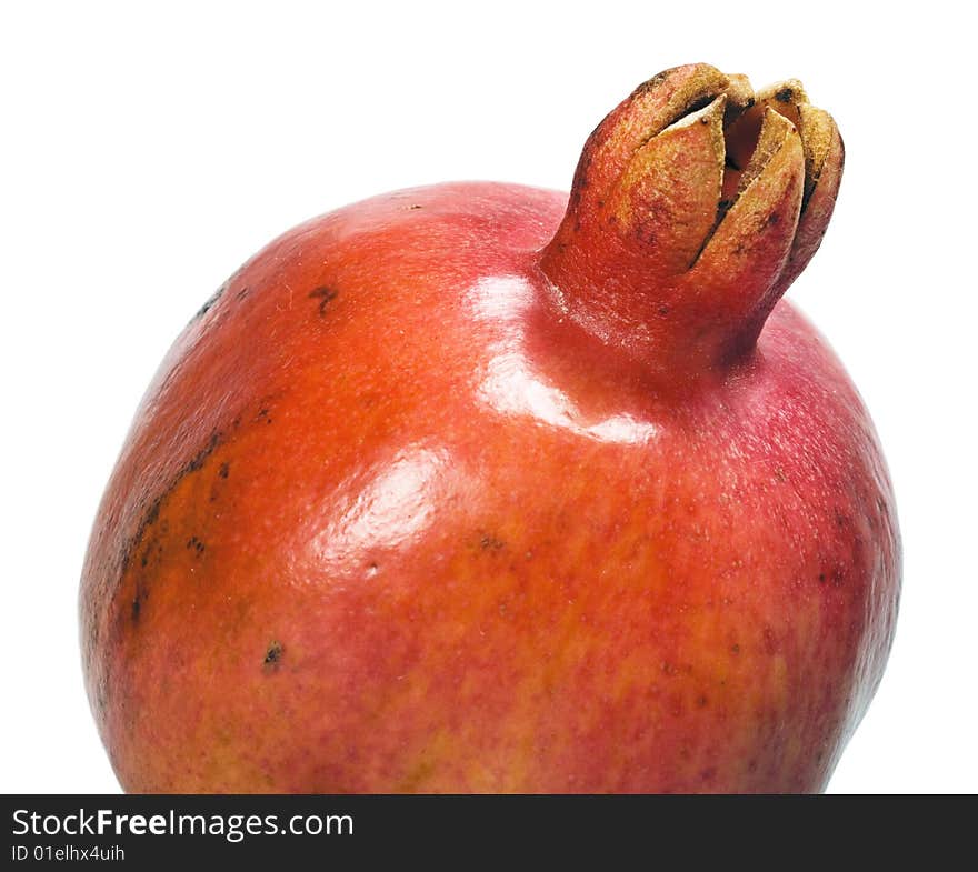 Pomegranate fruit with water drops.