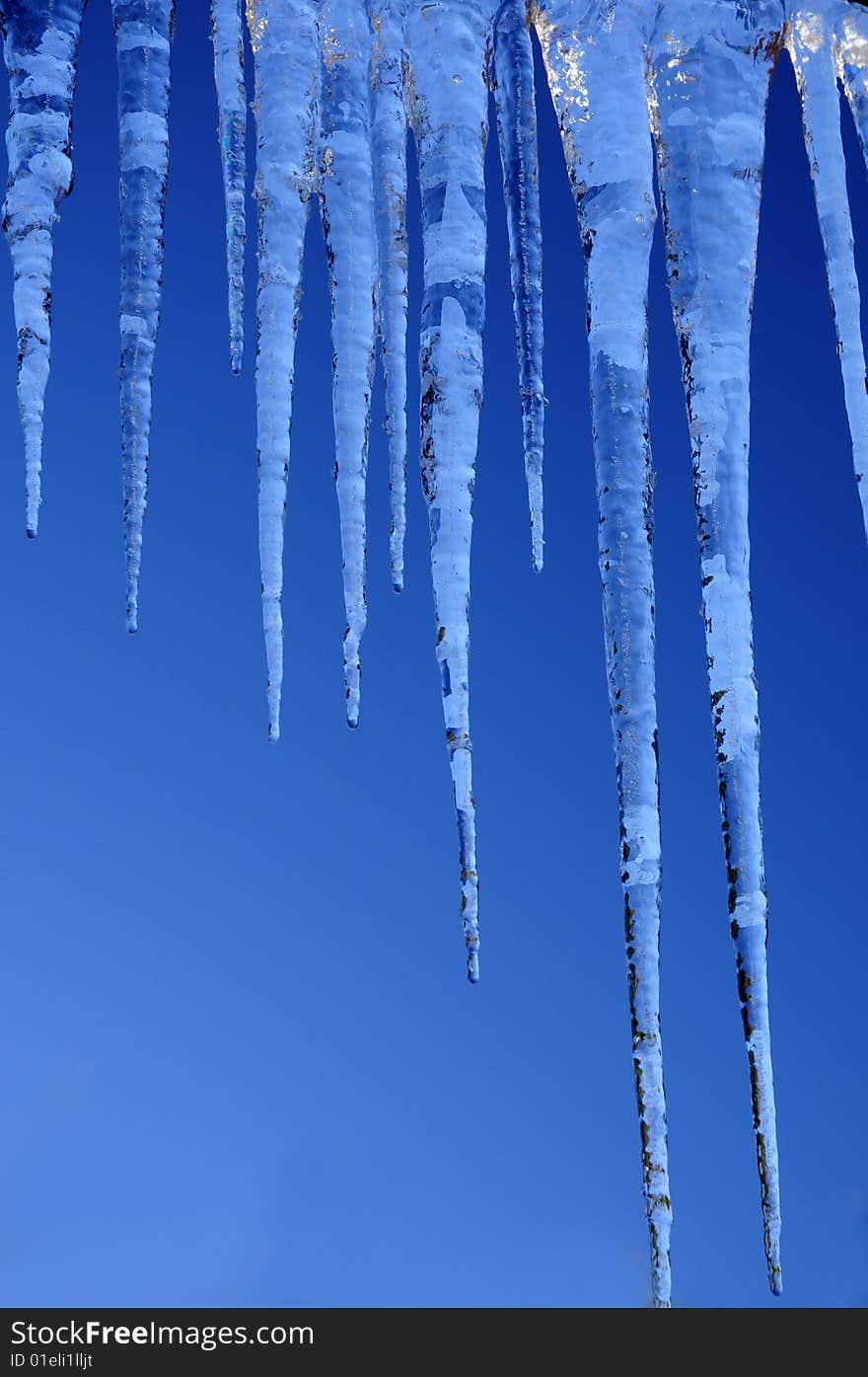 Beautiful icicles against a backdrop of the sky. Beautiful icicles against a backdrop of the sky