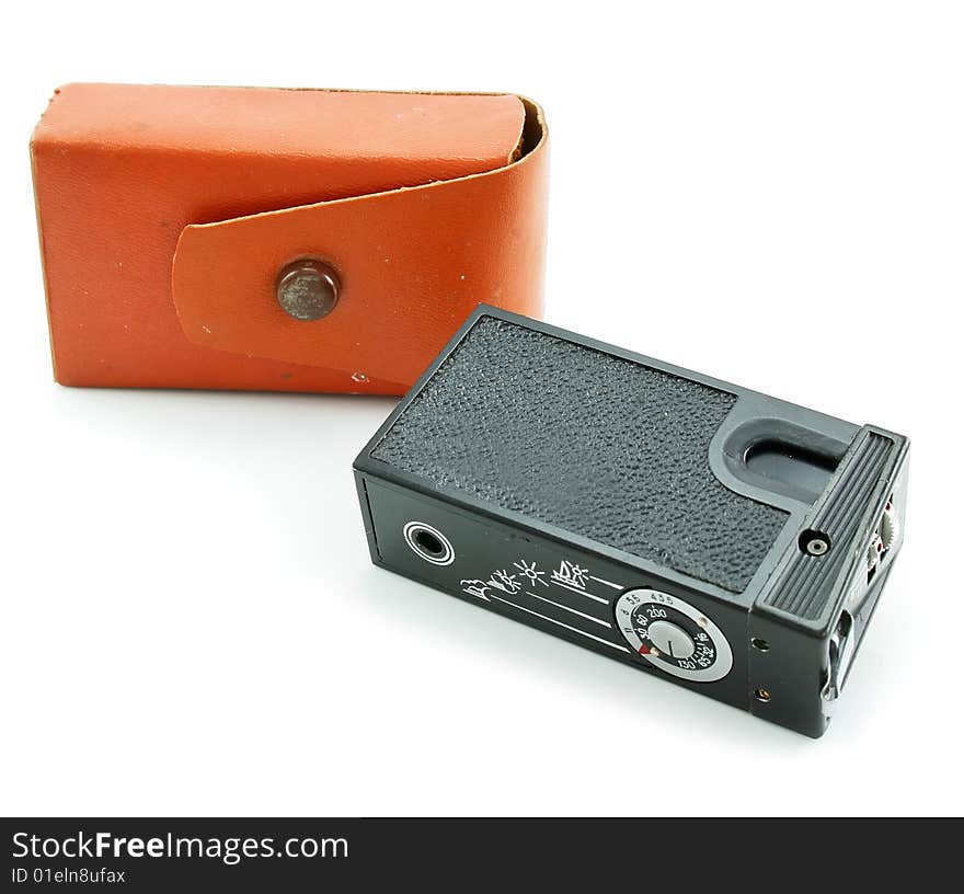 Small espionage photo camera isolated on a white background. Small espionage photo camera isolated on a white background