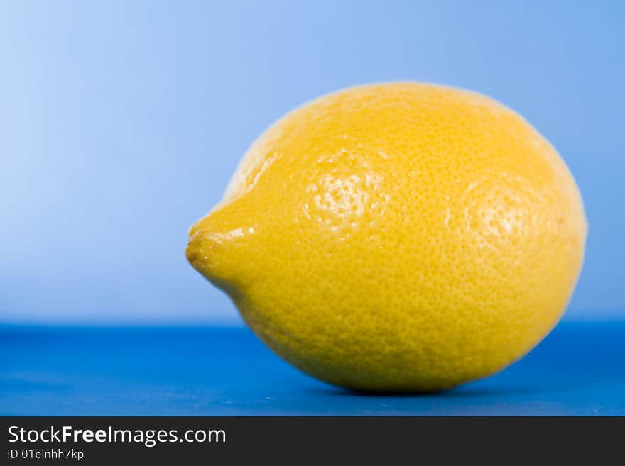 Lemon on blue background