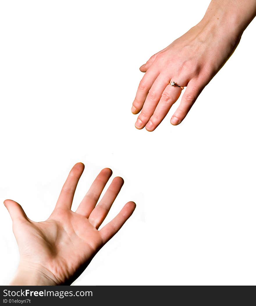 Man and woman's hands reaching for each other