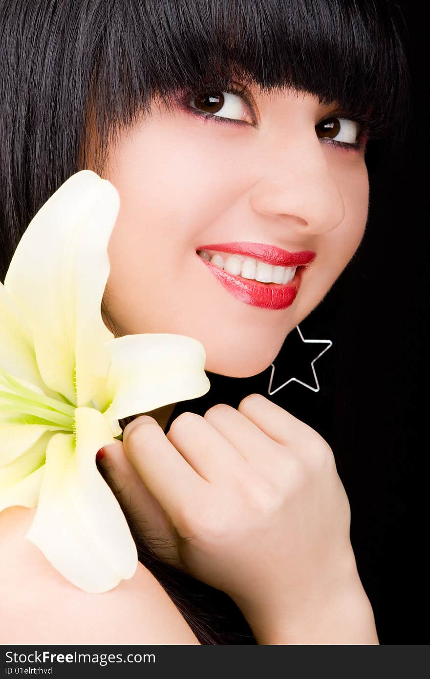 Young woman with lily flower. Young woman with lily flower